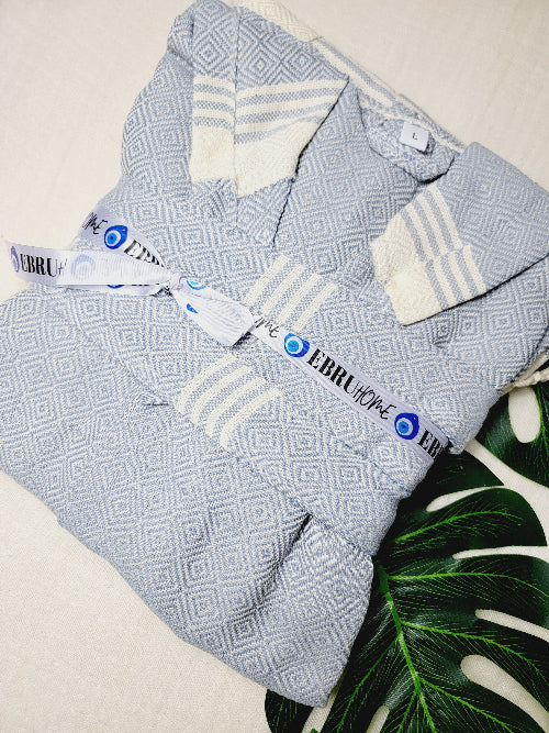Textile product with 'Ebruhome' branding on a neutral background