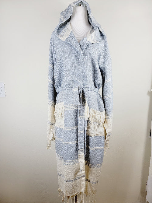 Light blue and white striped robe with hood on a mannequin against a plain background