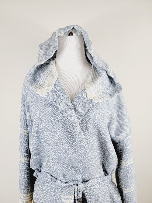 Light blue textured robe with hood on a mannequin against a light gray background