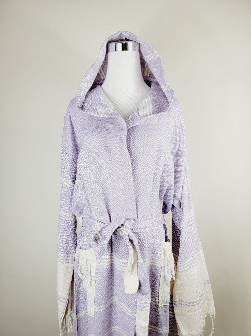 Lavender hooded robe on a mannequin against a plain background