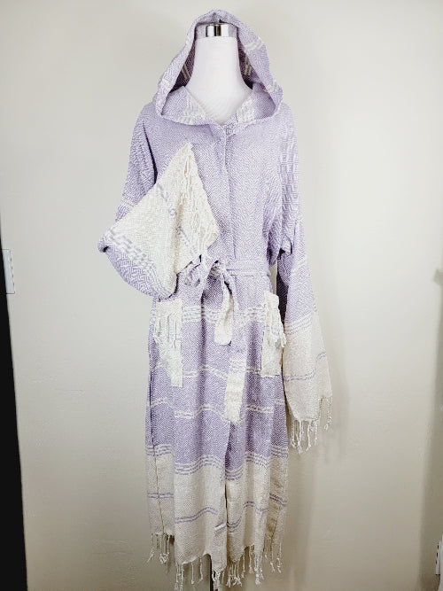 Lavender and white striped robe with hood on a mannequin against a plain background