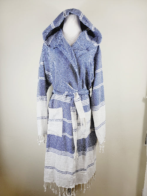 Blue and white striped robe with hood on a mannequin against a plain background