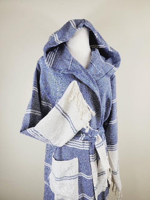 Blue and white striped robe with hood on a mannequin against a neutral background