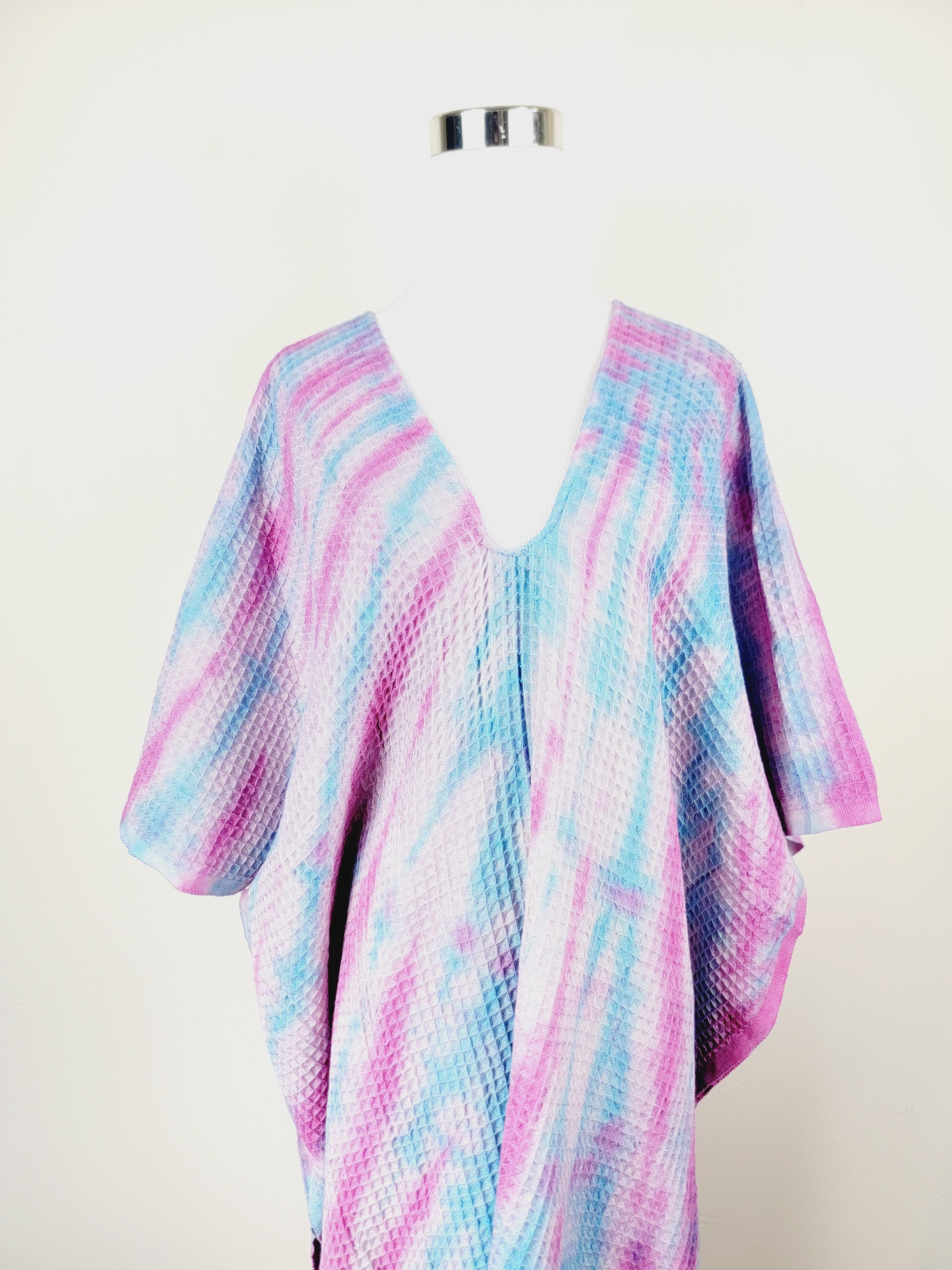 Colorful kimono-style garment with a white background