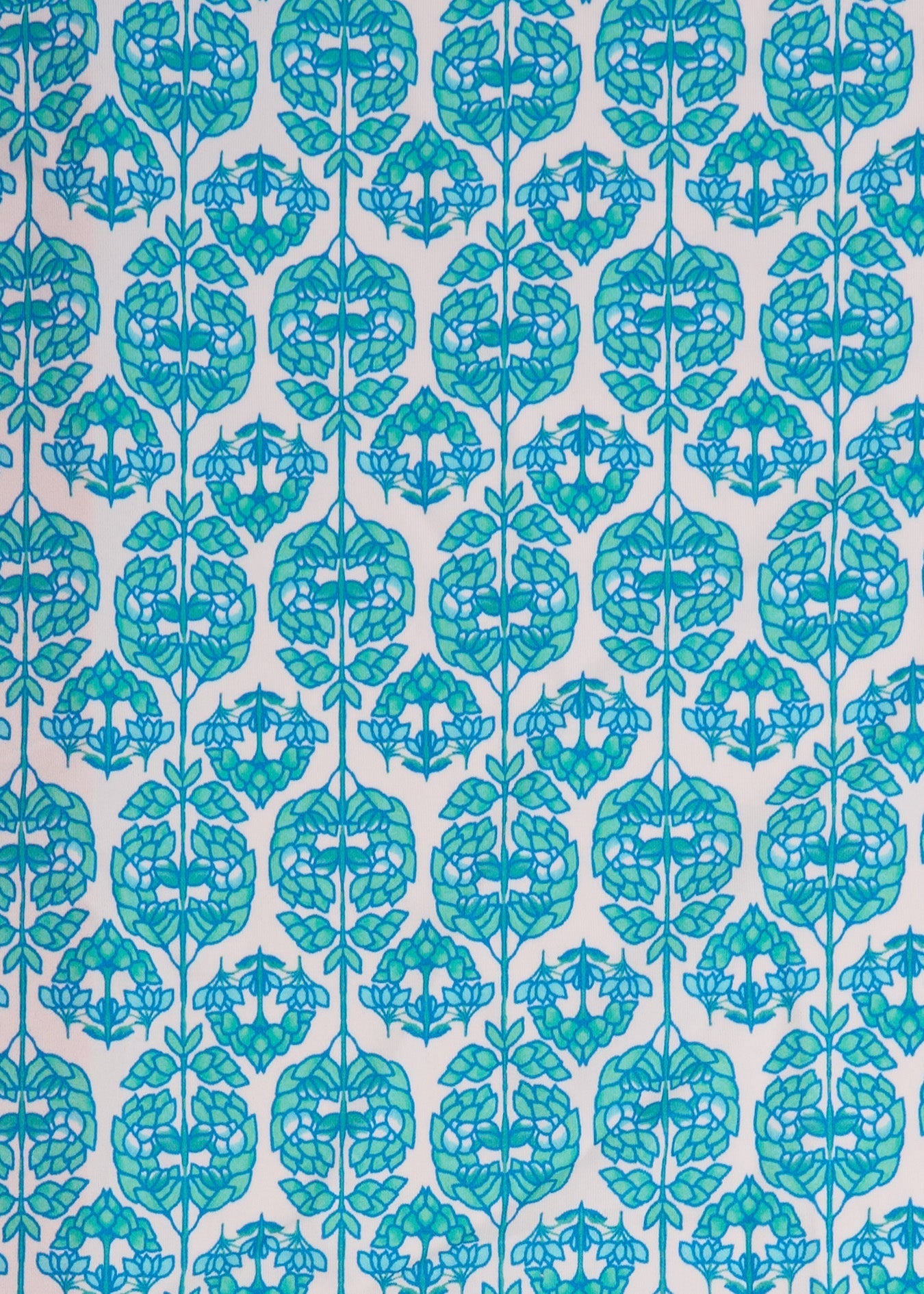 Teal floral pattern on a light blue background