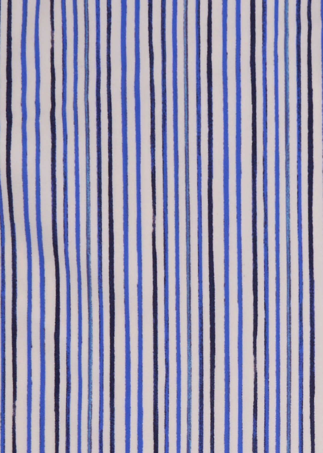 Striped fabric with blue, black, and white lines on a textured background