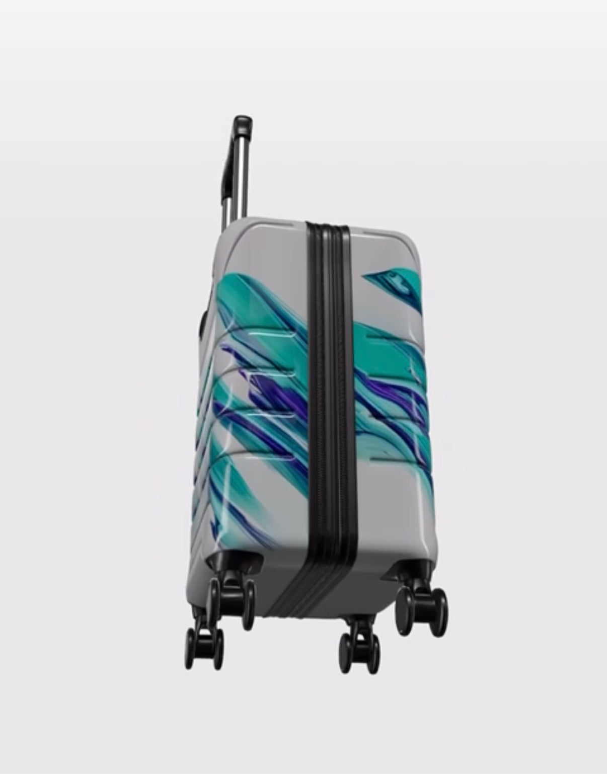 Gray suitcase with blue and green abstract design on a white background