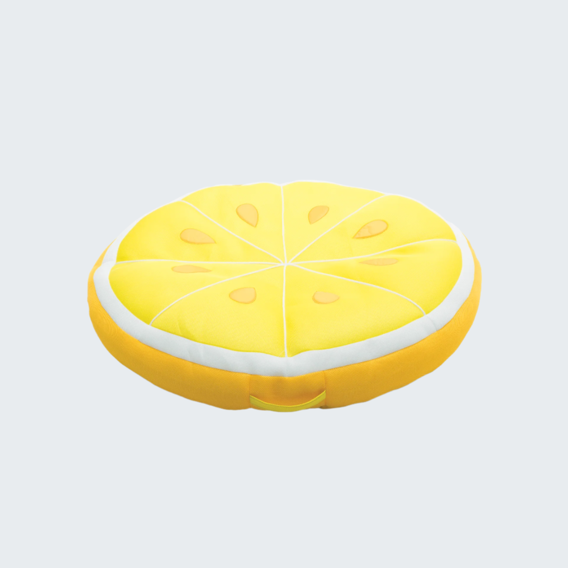 Yellow lemon-shaped cushion on a black background