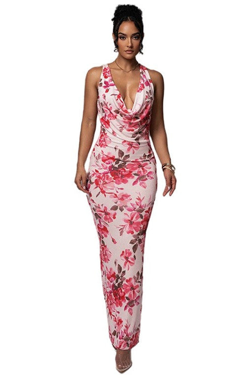 A model wearing a floral long maxi dress with a cowl neck, sleeveless design, and back slit.
