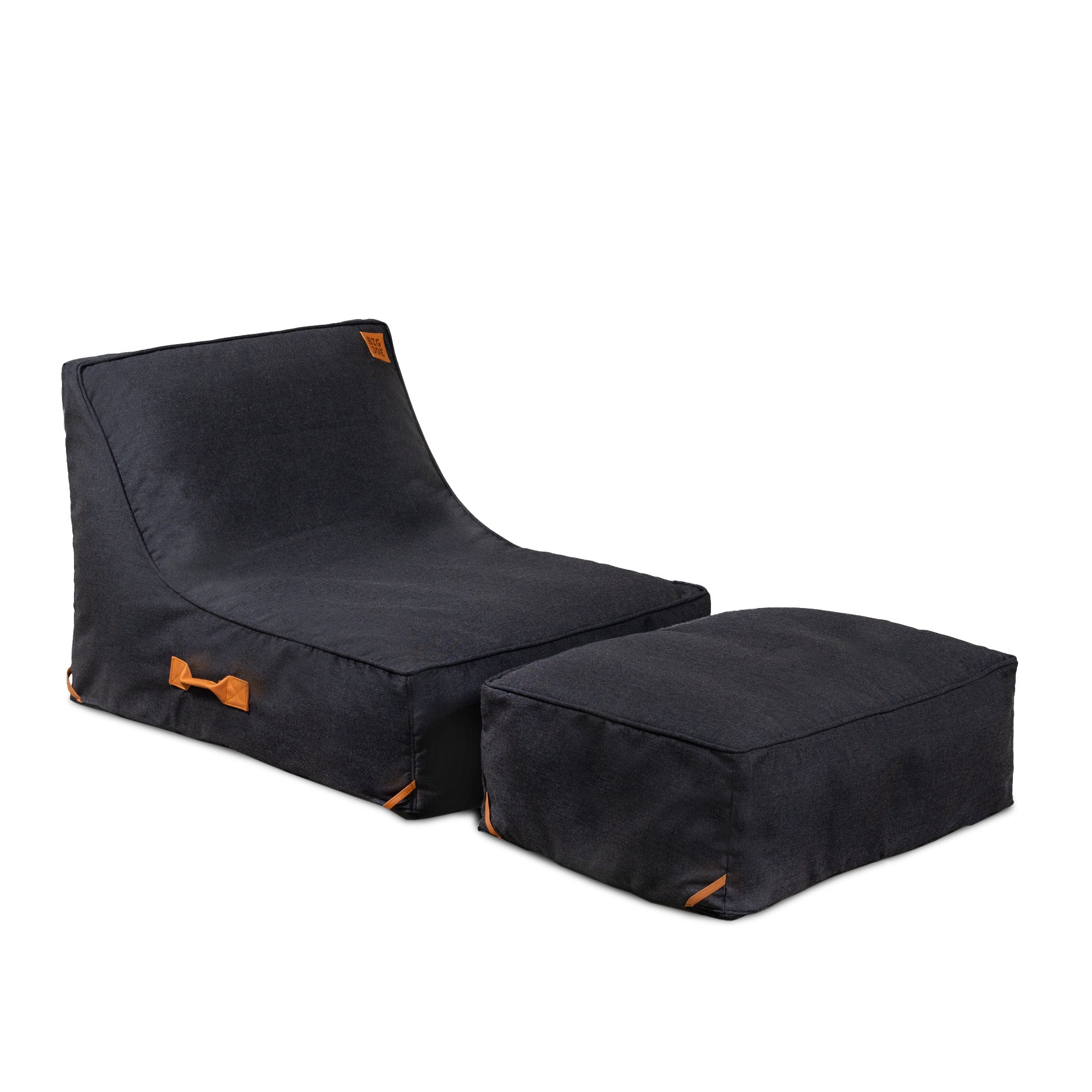 Black lounge chair with ottoman on a white background
