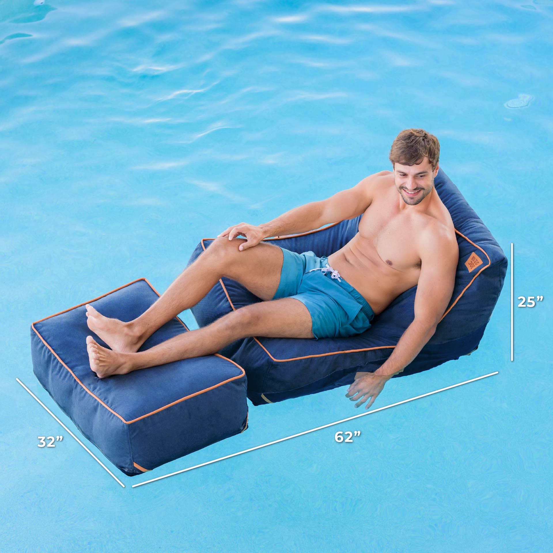 Man sitting on a blue inflatable pool lounger with dimensions displayed, against a blue pool background.