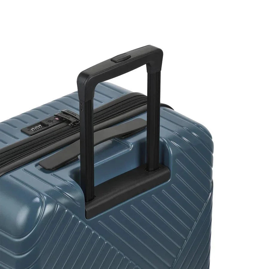 Blue suitcase with a black handle on a white background