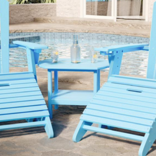 Blue patio furniture set by a poolside