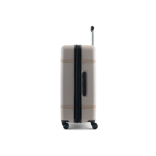 Beige suitcase with black handle and wheels on a white background