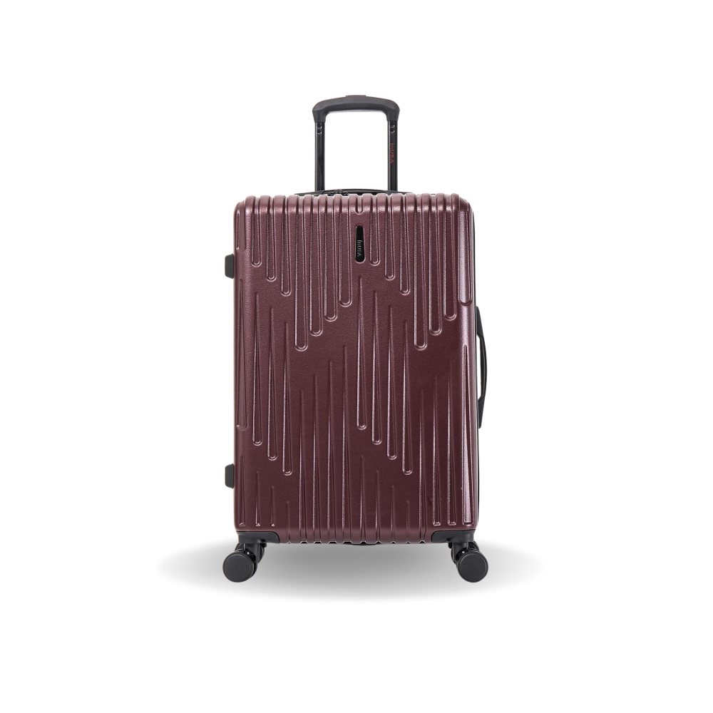 Purple suitcase with a textured surface on a white background