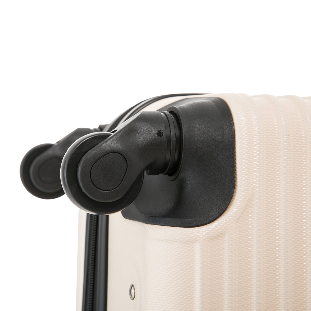 Close-up of a beige suitcase handle on a white background