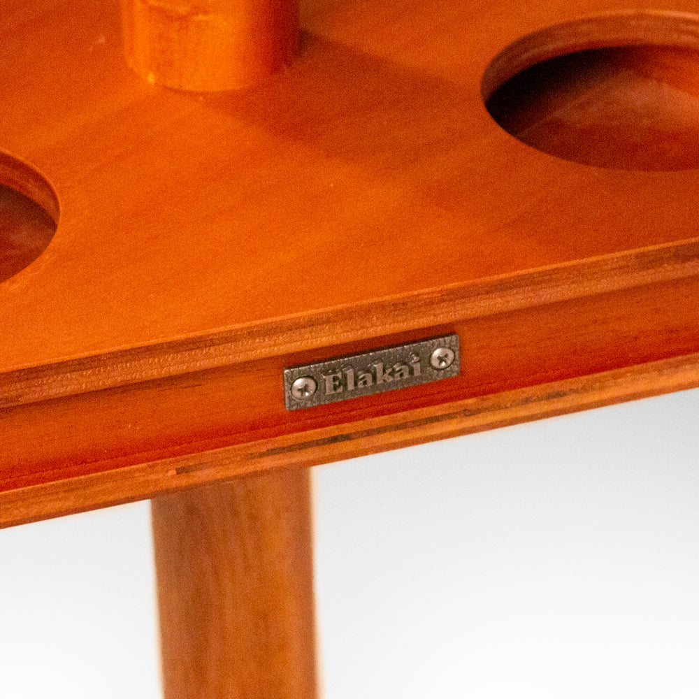 Wooden product with 'Elakai' branding on a white background