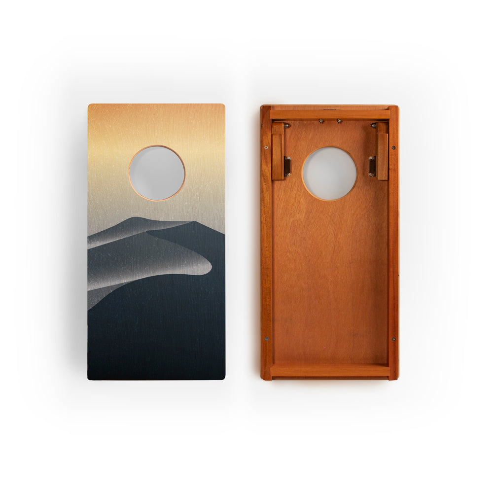 Two wooden boards with artistic designs on a white background
