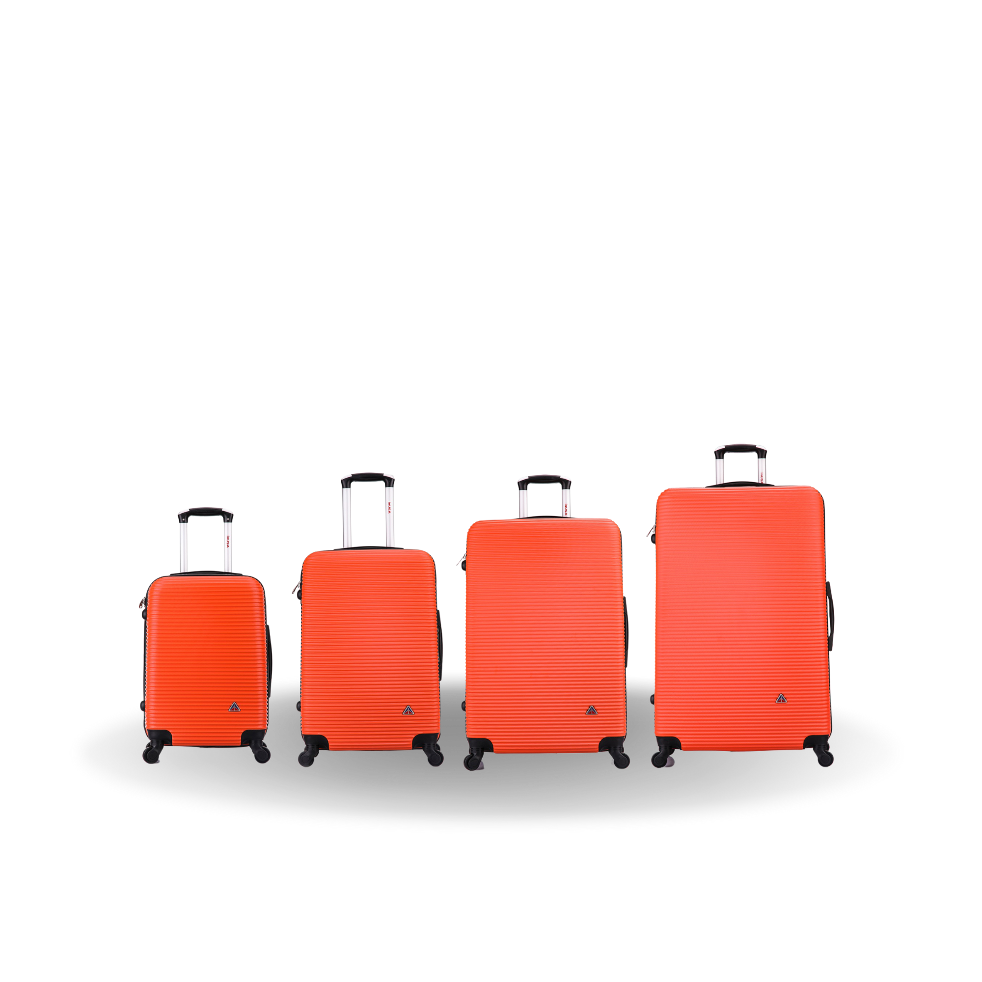 Four orange suitcases of different sizes on a white background