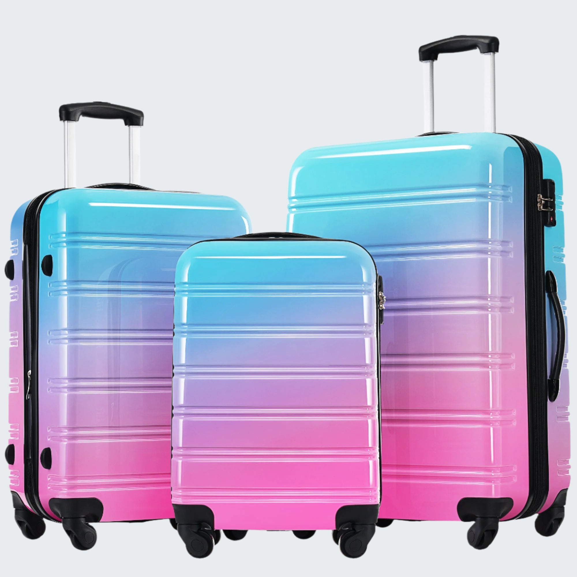 A set of three expandable hardshell suitcases with spinner wheels and TSA locks, in gradient colors of blue and red.