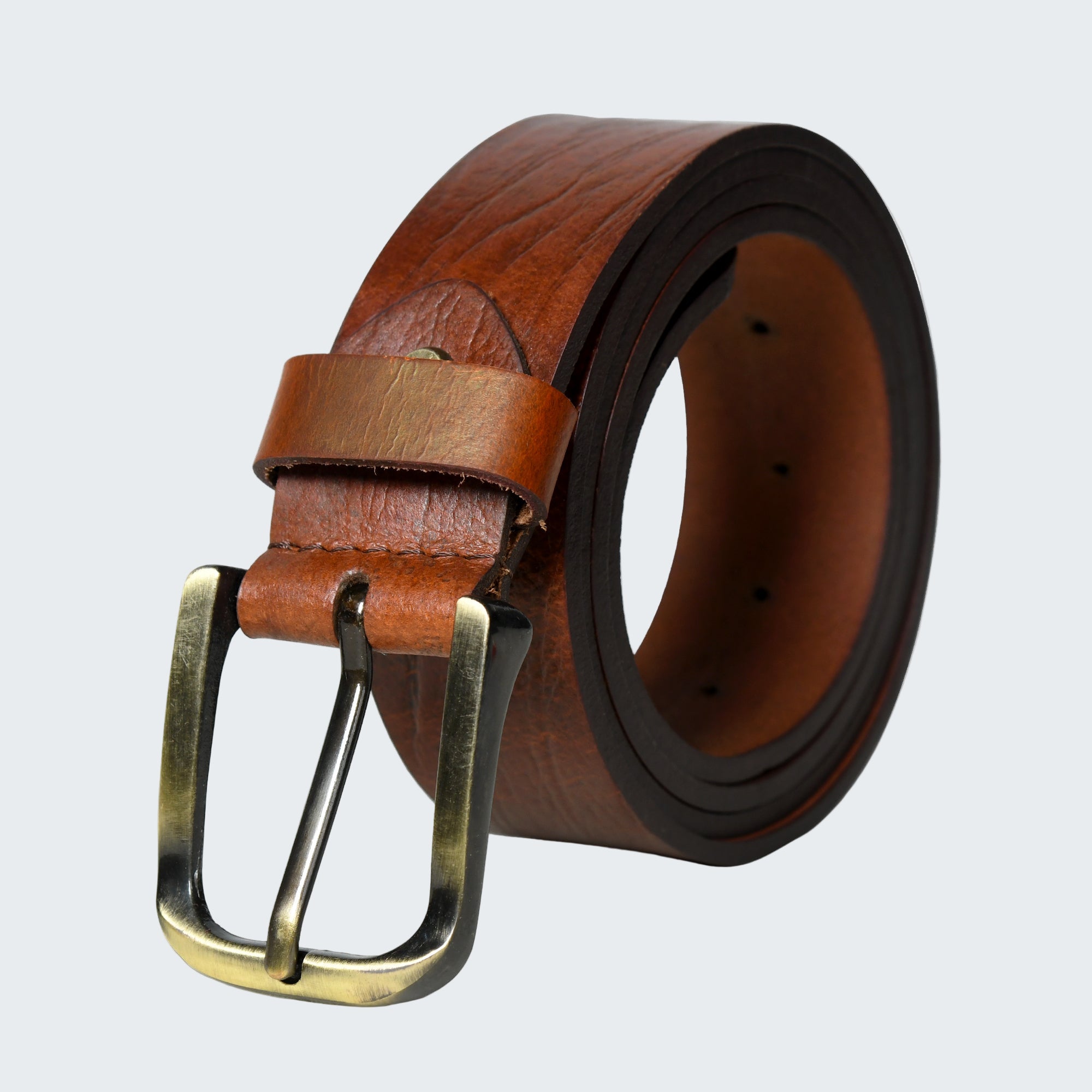 Brown leather belt with brass buckle on a white background