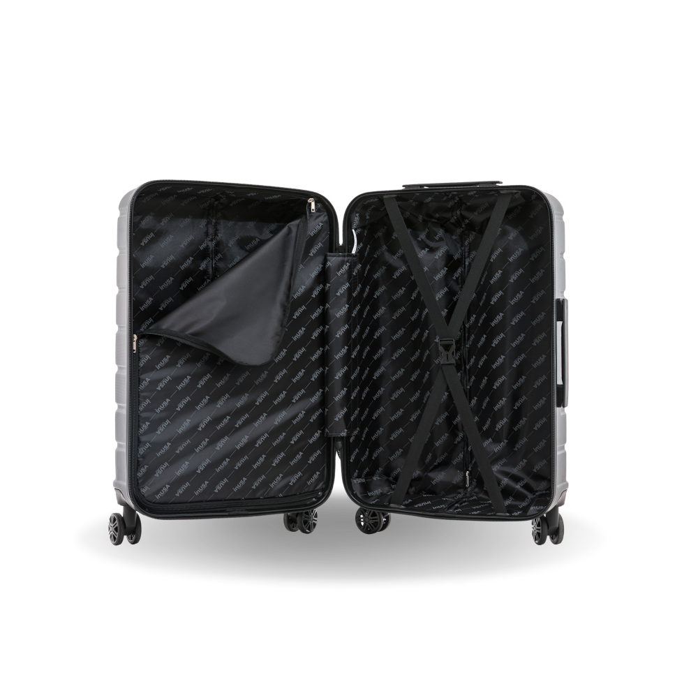 Black suitcase with open compartments on a white background