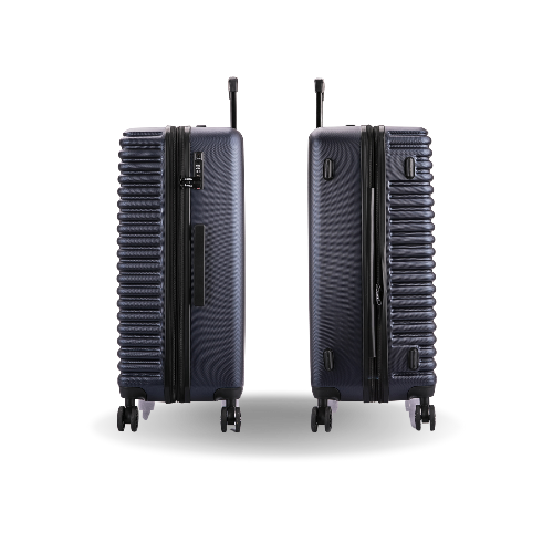Two dark gray suitcases with wheels on a white background