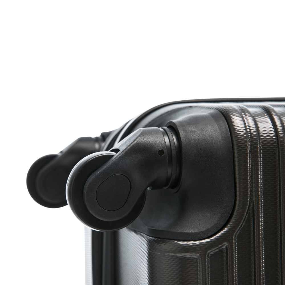 Close-up of a black suitcase handle on a white background