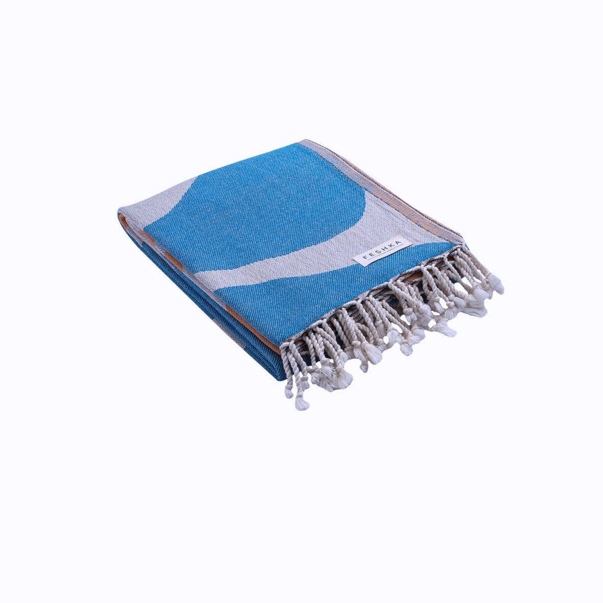 Blue and white towel with tassels on a white background