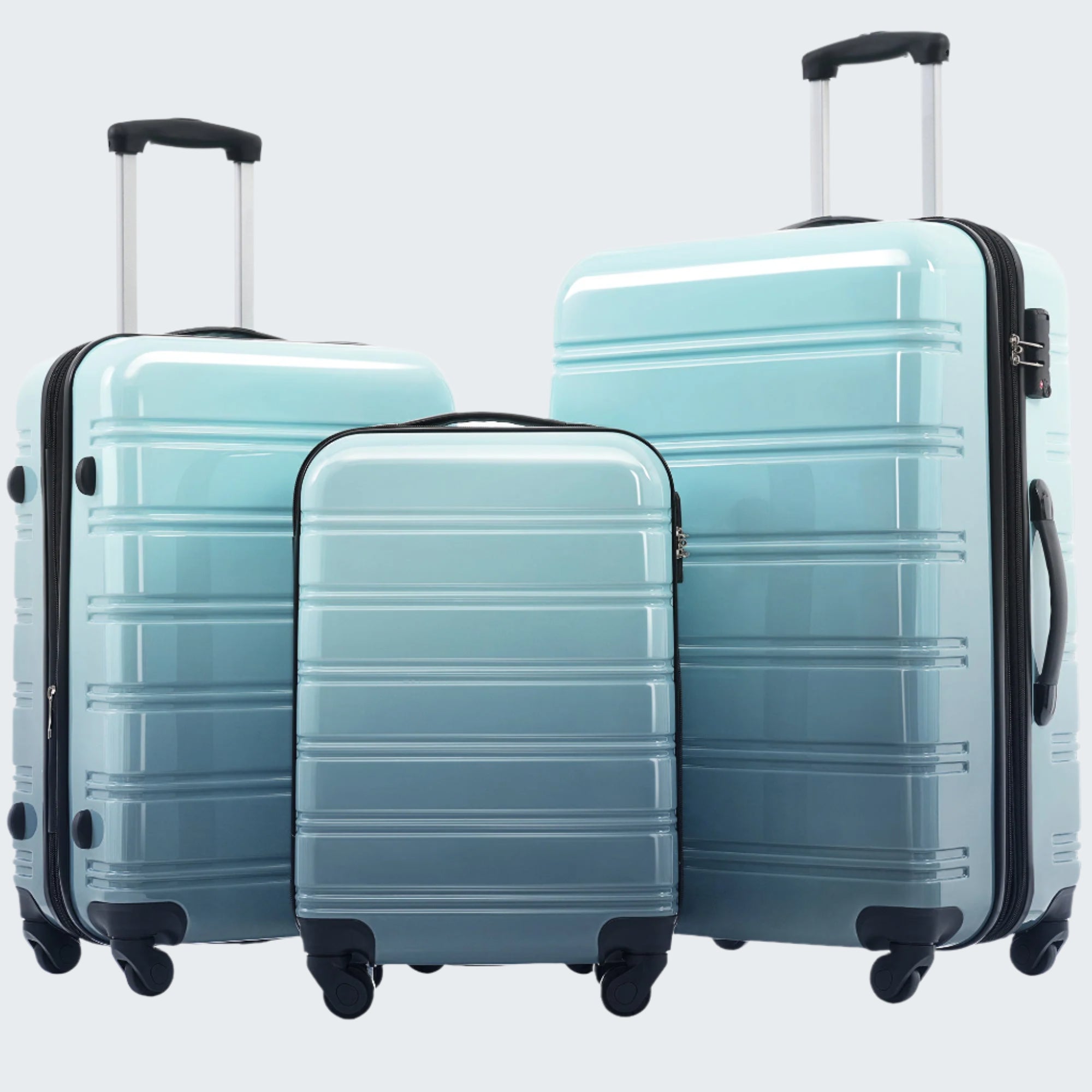 A set of three blue gradient hardshell suitcases with spinner wheels and TSA locks.