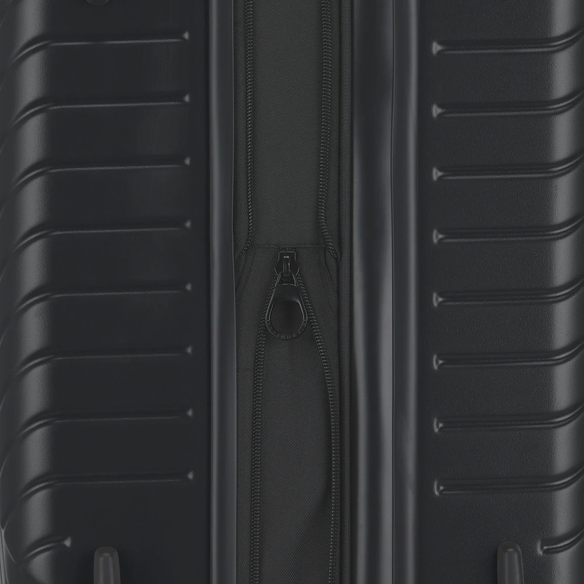 Close-up of a black suitcase with a zipper