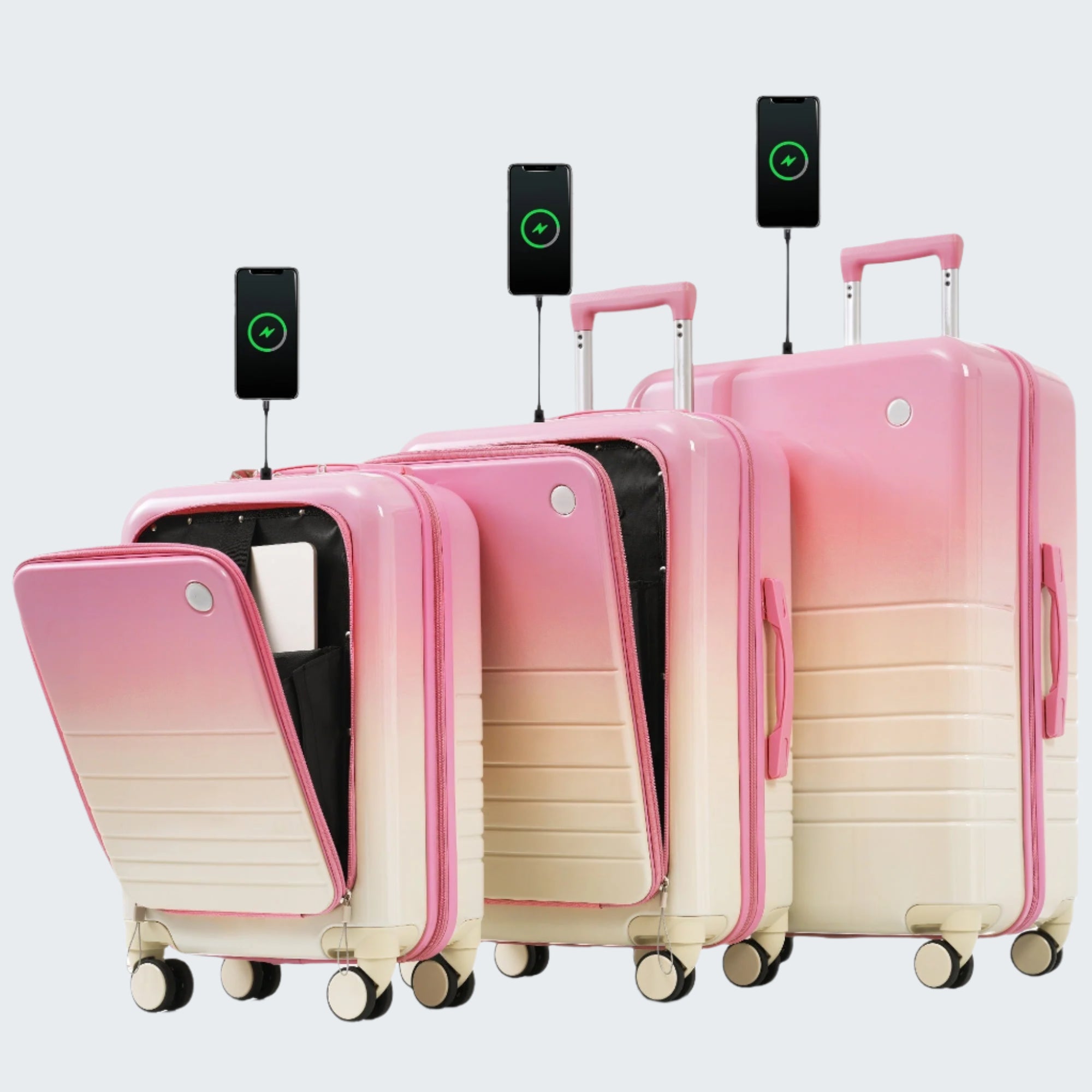 A set of three pink luggage bags with USB ports, spinner wheels, and front opening design placed side by side.