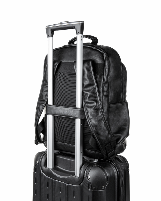 Black backpack with rolling handle on top of a black suitcase