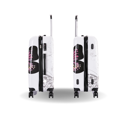 Two white suitcases with floral designs on a white background