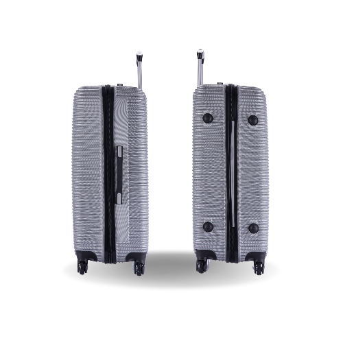Two silver suitcases with black accents on a white background
