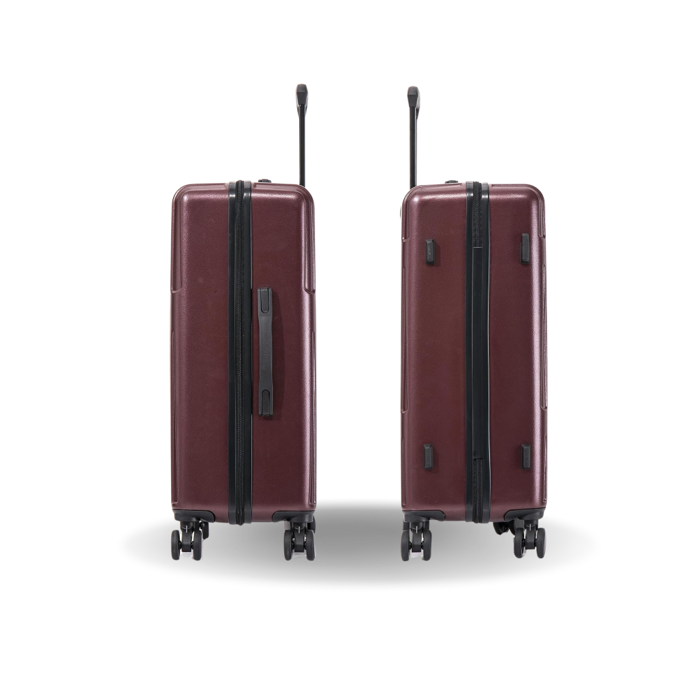 Two maroon suitcases with black handles and wheels on a white background