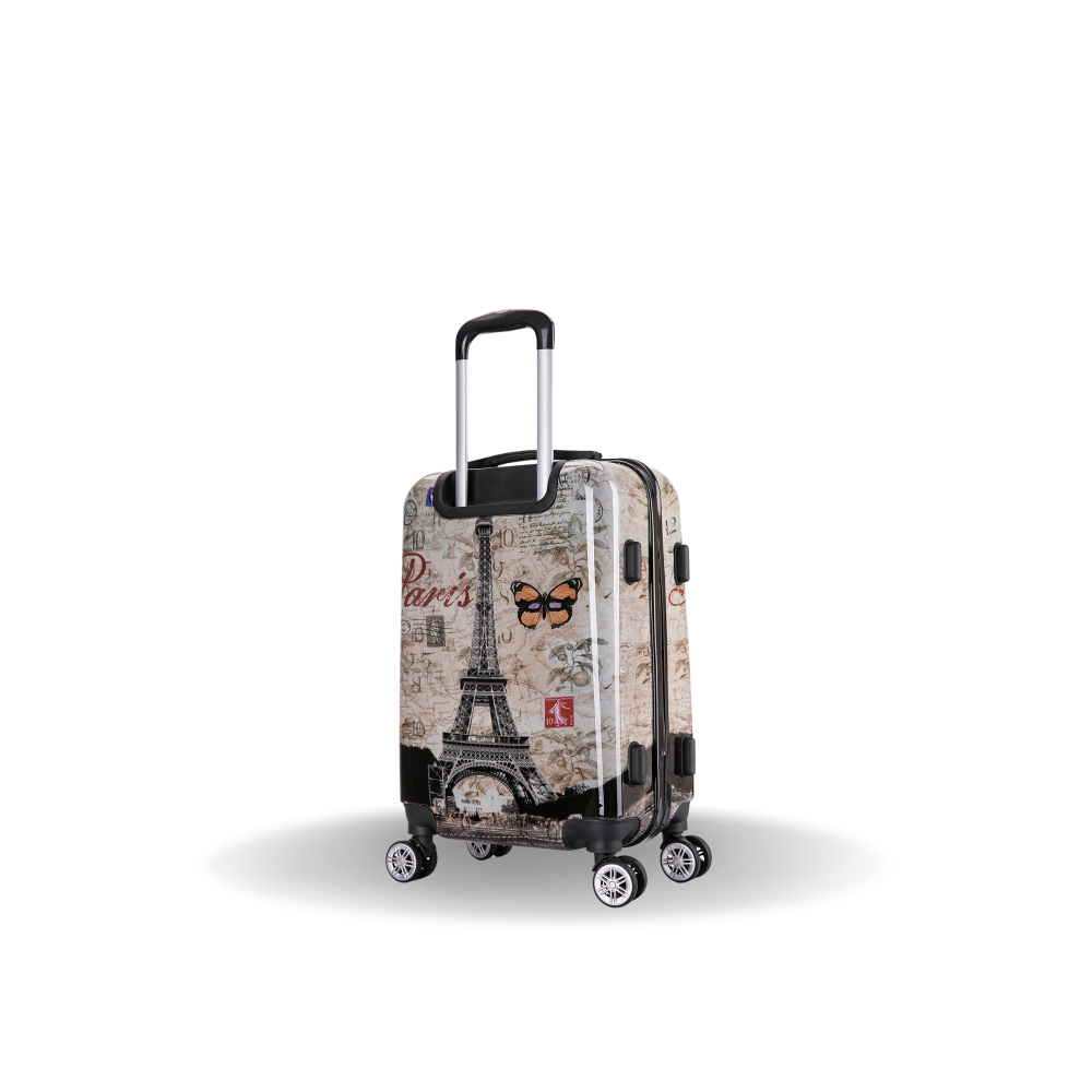 Travel suitcase with Paris-themed design on a white background
