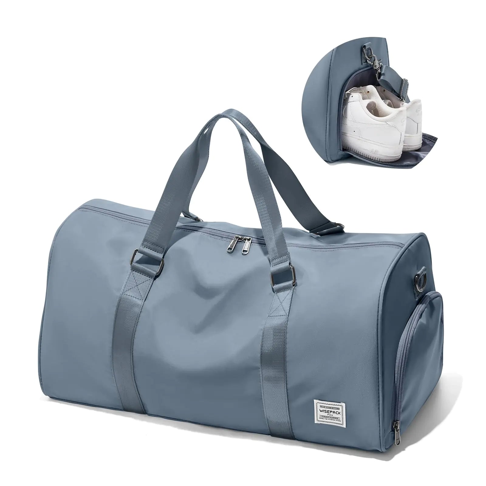 Blue duffel bag with a shoe compartment on a white background