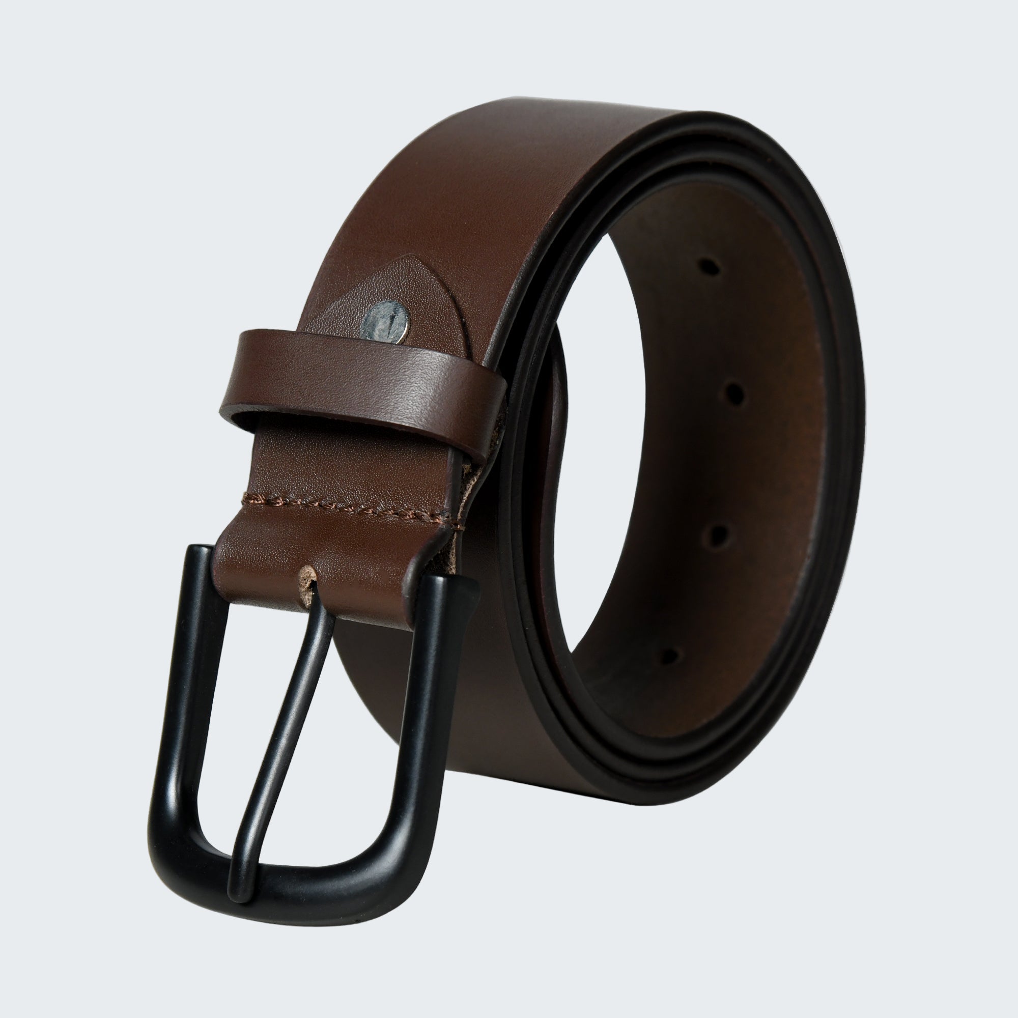 Brown leather belt with black buckle on a white background