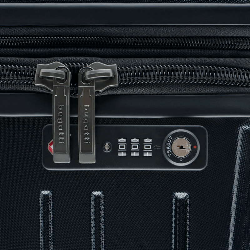 Close-up of a black suitcase with a zipper and security lock.