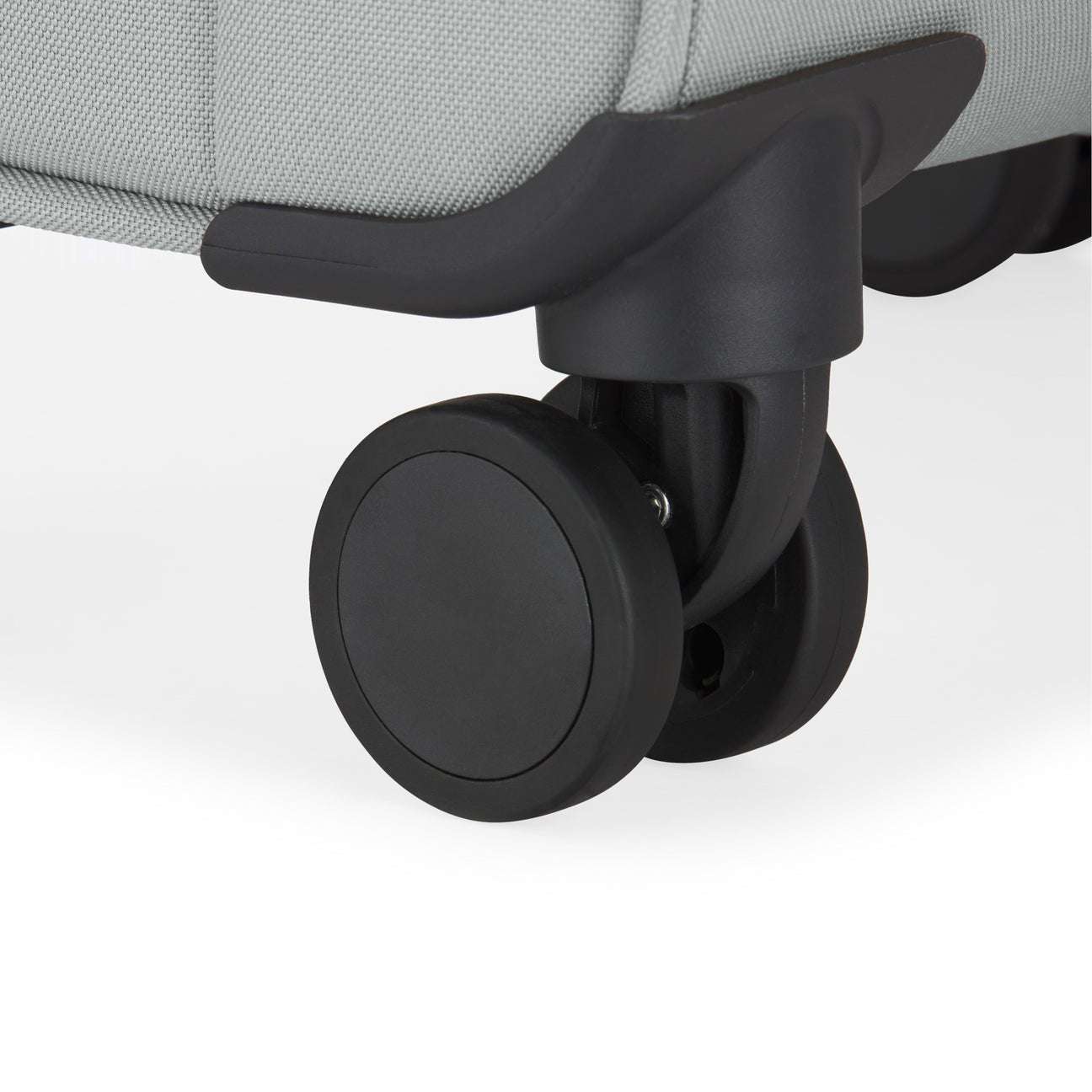Close-up of a black caster wheel on a chair with a gray cushioned seat.