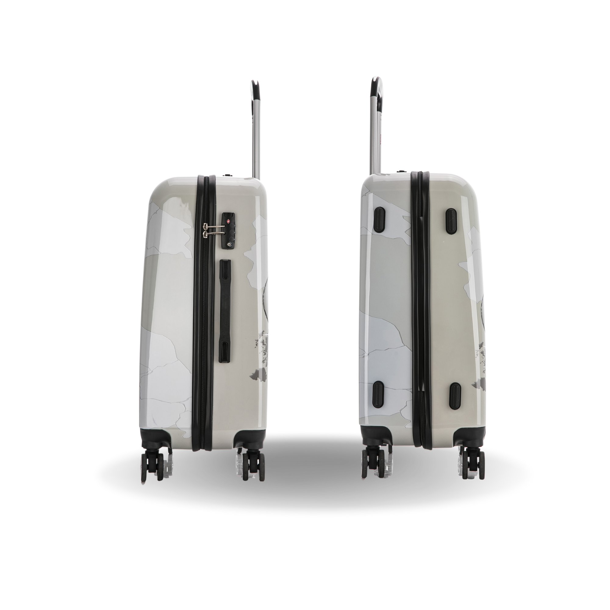 Two beige suitcases with black accents on a white background