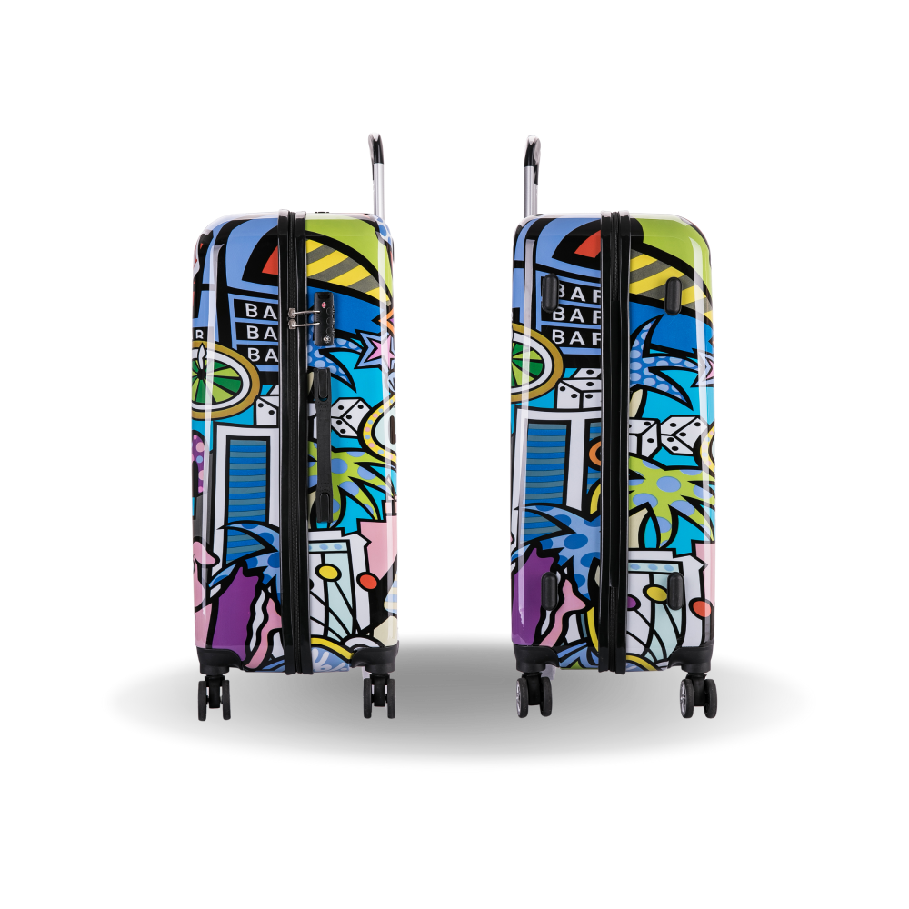 Two colorful suitcases with abstract patterns on a white background