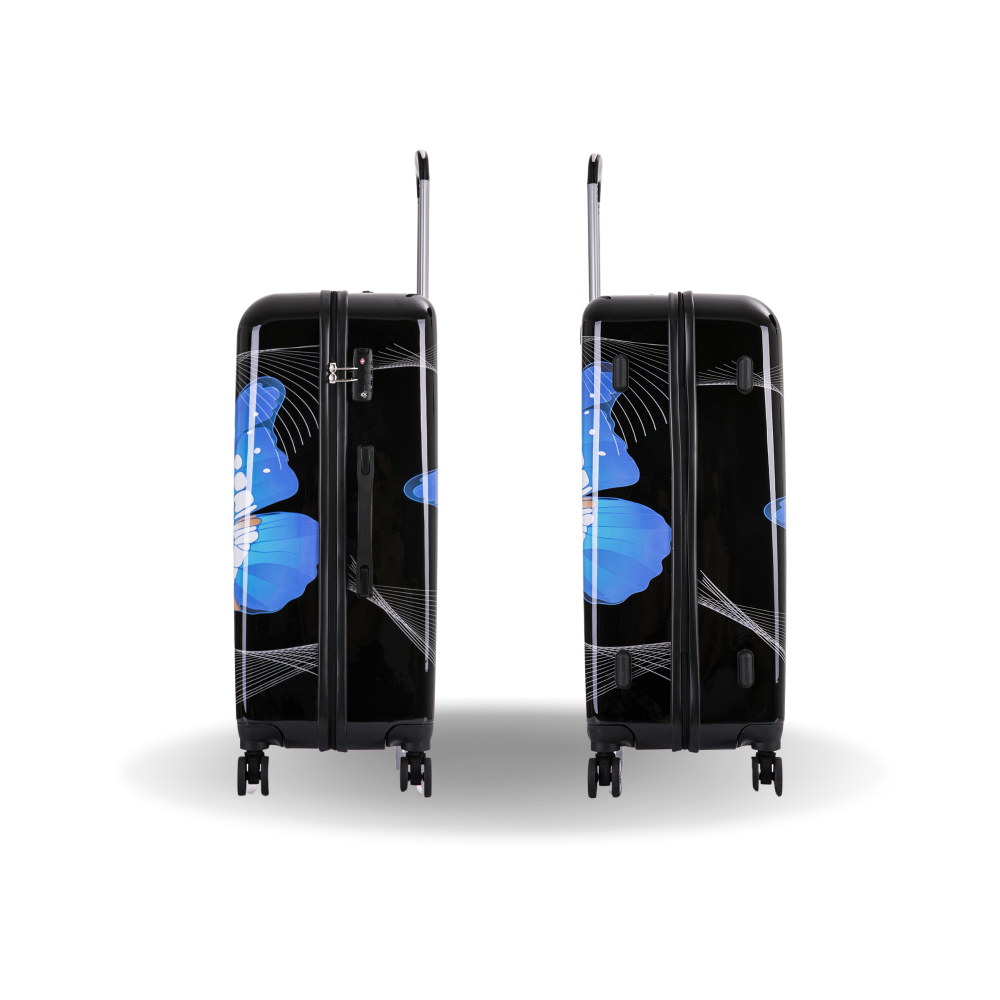 Black suitcase with blue butterfly design on a white background