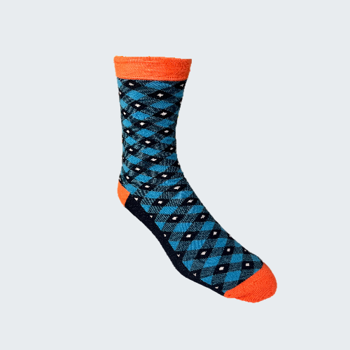 Blue and black argyle pattern sock with orange accents on a white background