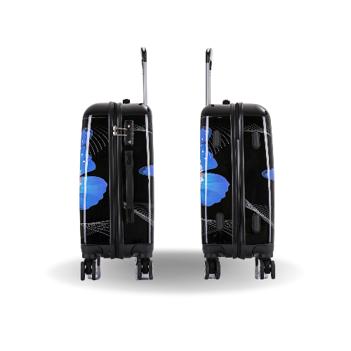 Black suitcase with blue butterfly design on a white background