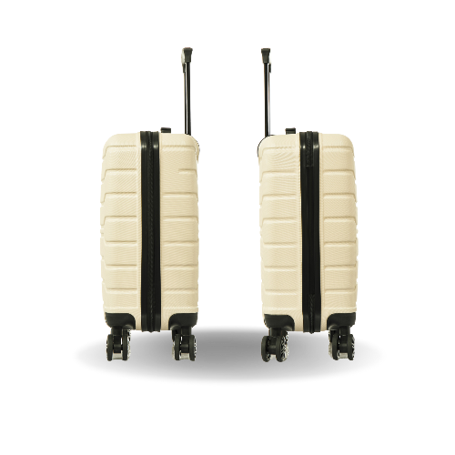 Two beige suitcases with black straps on a white background