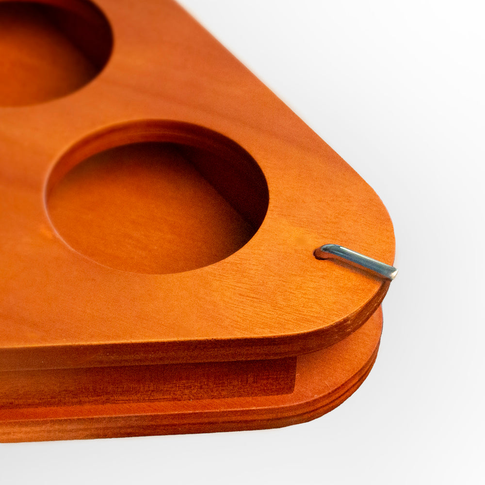 Wooden product with cut-out sections on a white background