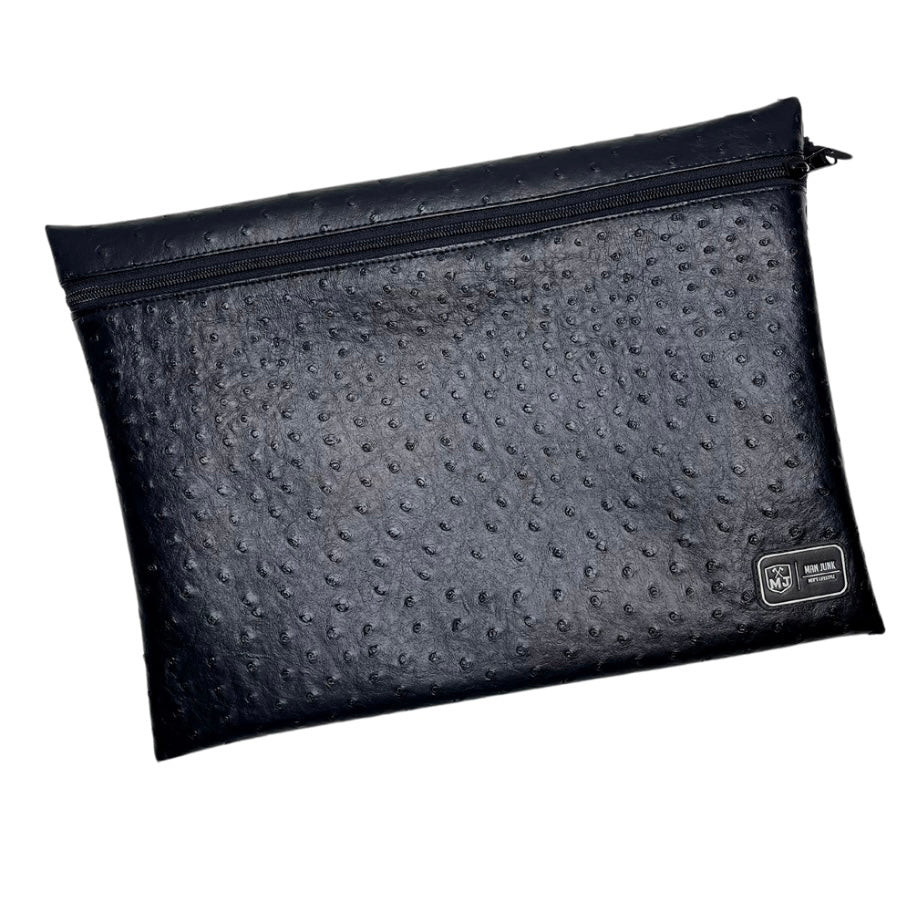 Black textured pouch with a zipper on a white background