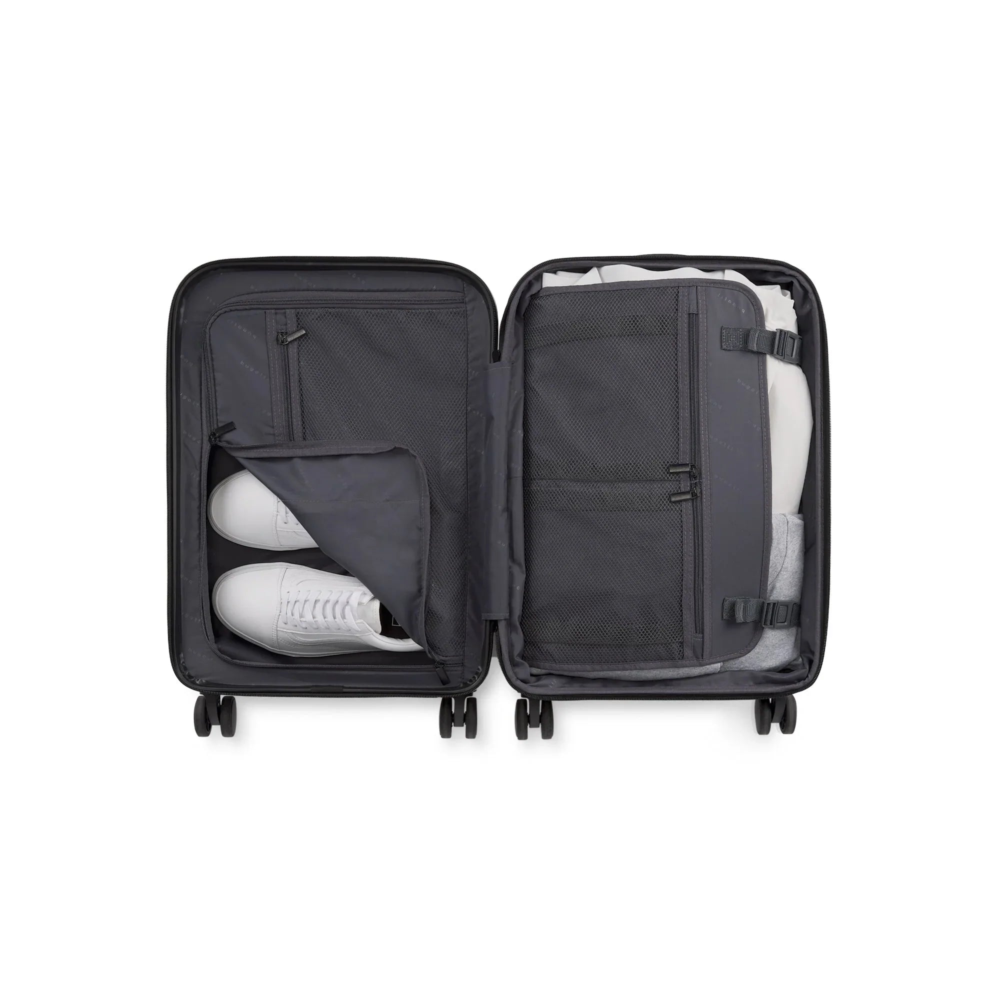 Black suitcase with white shoes inside on a white background